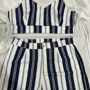 White and Navy Top and Short Set With Gold and Pink Accents